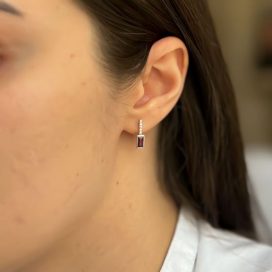 Silver earrings with a 1.145-carat ruby and cubic zirconia