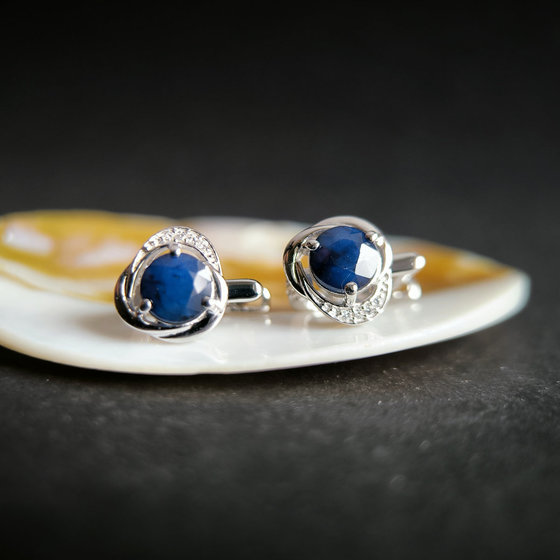 Silver earrings with a 3.31-carat sapphire and cubic zirconia