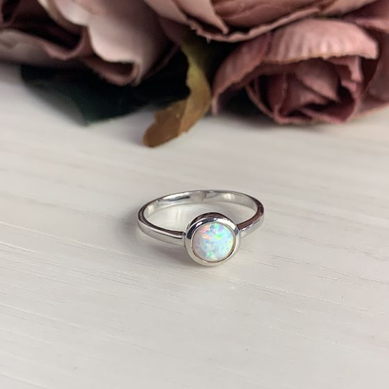 Silver ring with an opal