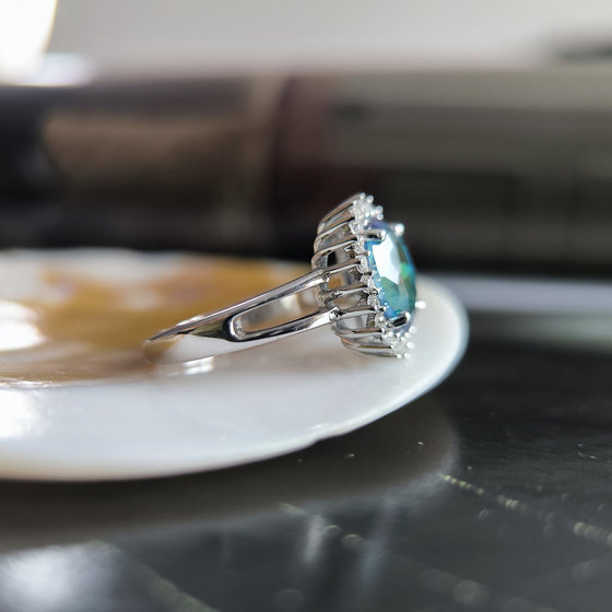 Silver ring with mystic topaz
