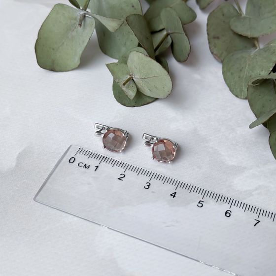 Silver earrings with 5.575 ct sultanaite