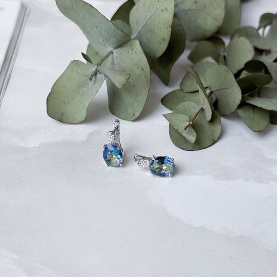Silver earrings with a 3.817-carat mystic topaz