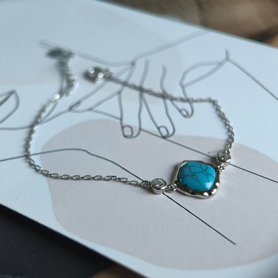 Silver bracelet with turquoise, fianites
