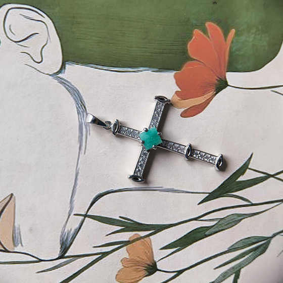Silver cross with emerald and cubic zirconia
