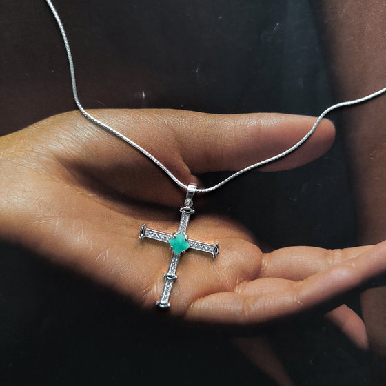 Silver cross with emerald and cubic zirconia