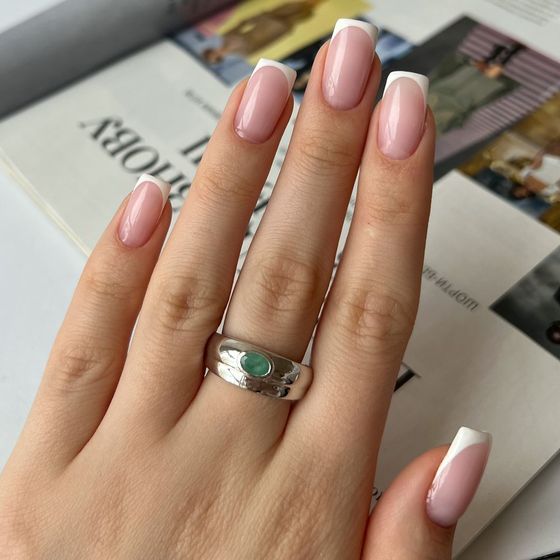 Silver ring with emerald 0.4ct