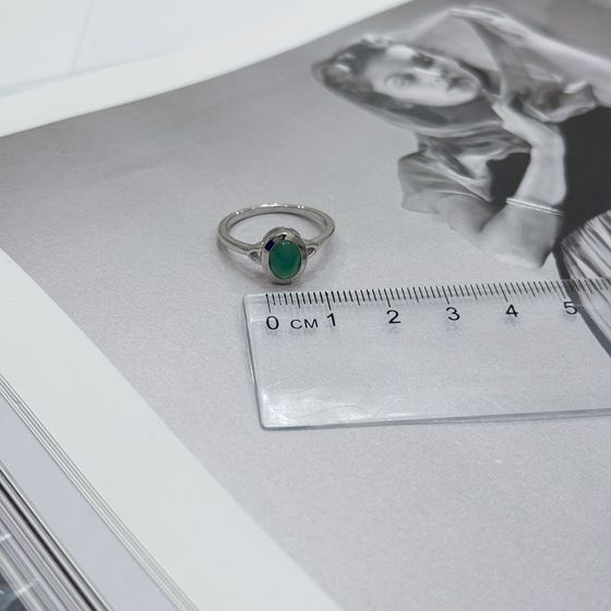 Silver ring with emerald