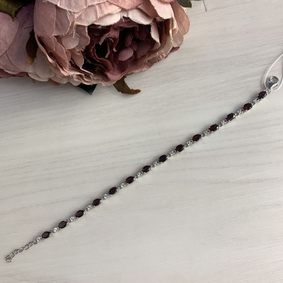 Silver bracelet with garnet