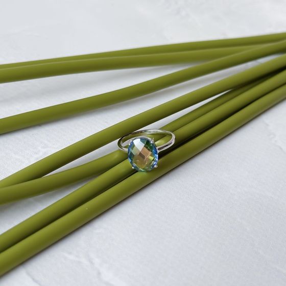 Silver ring with mystic topaz