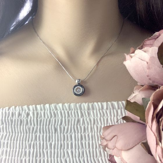 Silver pendant with ceramics