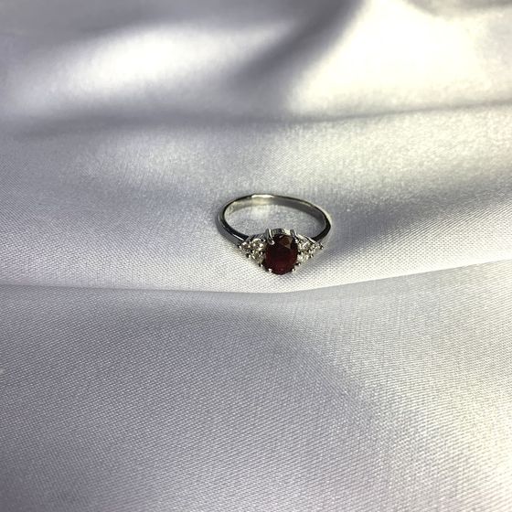 Silver ring with a ruby