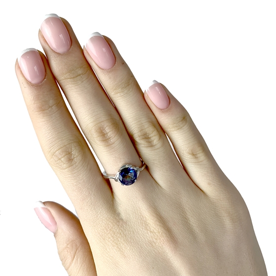 Silver ring with a mystic topaz