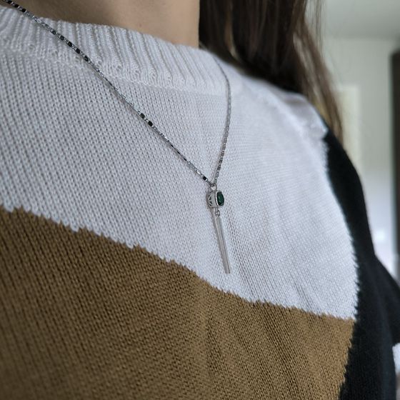 Silver pendant with a 0.605-carat nano emerald