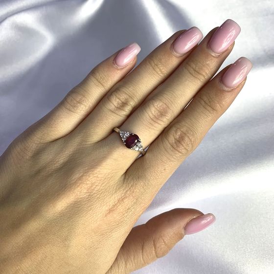 Silver ring with a ruby