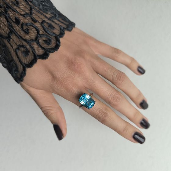 Silver ring with topaz