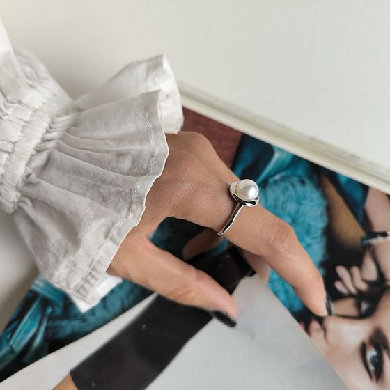 Silver ring with pearls