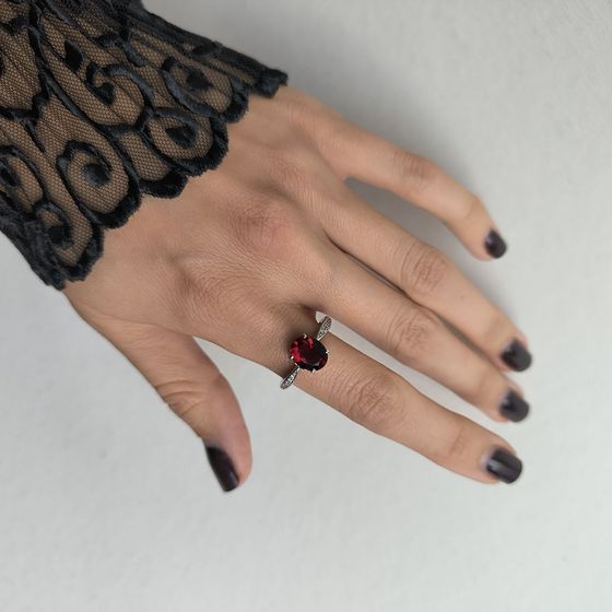 Silver ring with a garnet (nano)