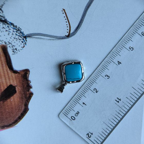 Silver pendant with turquoise