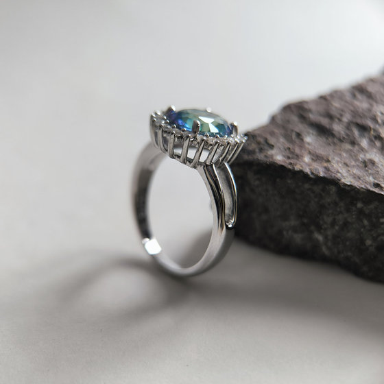Silver ring with mystic topaz