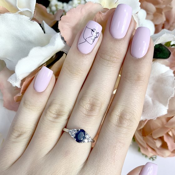 Silver ring with a sapphire