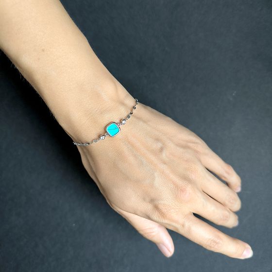 Silver bracelet with turquoise, fianites