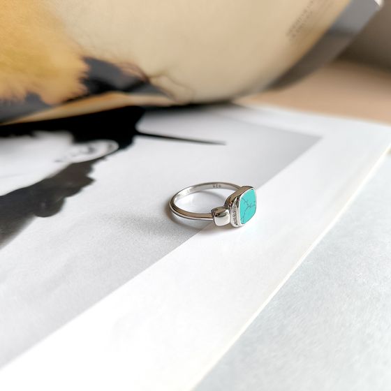 Silver ring with turquoise, fianites