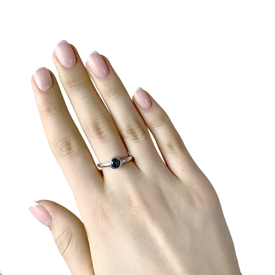 Silver ring with a mystic topaz