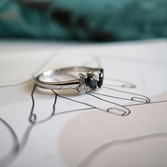 Silver ring with sapphire and cubic zirconia