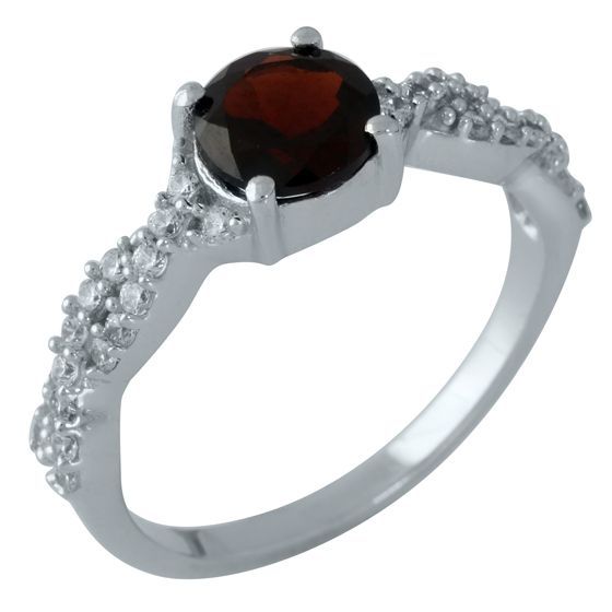 Silver ring with a garnet
