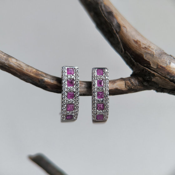 Silver earrings with a 1.455ct ruby and cubic zirconia
