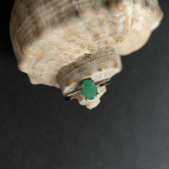 Silver ring with emerald, fianites