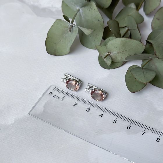 Silver earrings with 5.116 carats of sultanite