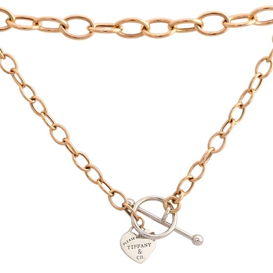 A gold necklace without stones