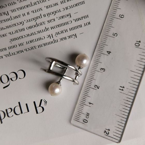 Silver ring with pearls