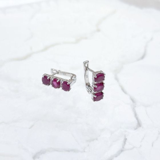 Silver earrings with a ruby and cubic zirconia