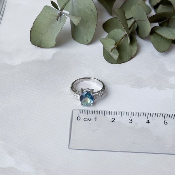 Silver ring with mystic topaz