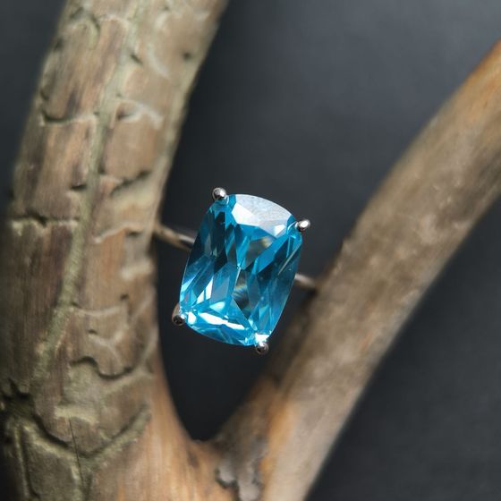 Silver ring with topaz