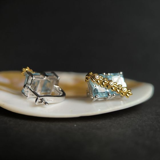 Silver earrings with topaz, fianites