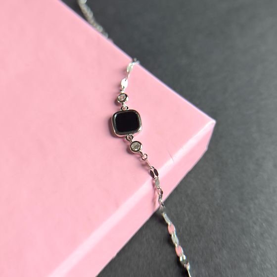 Silver bracelet with onyx, fianites