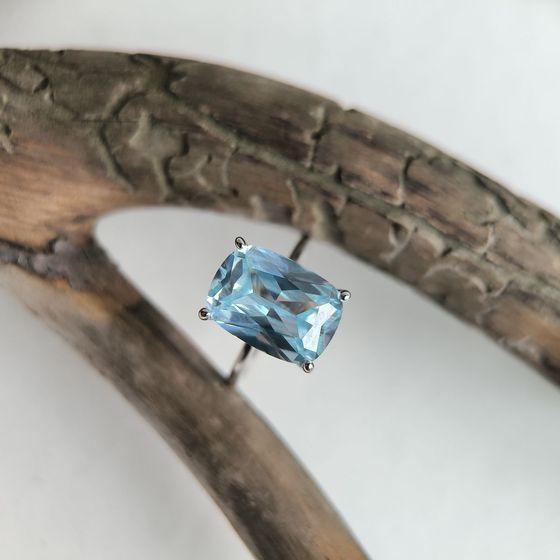 Silver ring with topaz