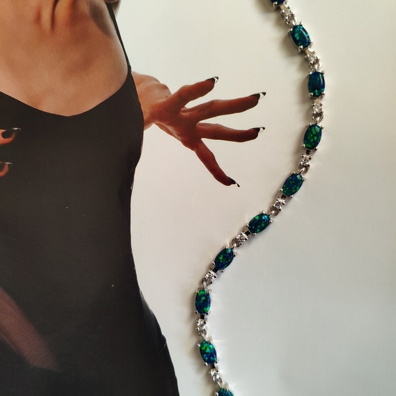 Silver bracelet with opal, fianites
