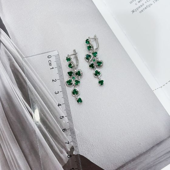 Silver earrings with a 3.625-carat nano emerald