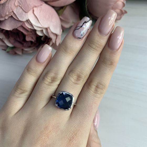 Срібна каблучка з топазом Лондон Блю