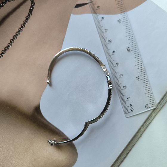 Silver bracelet with onyx, fianites