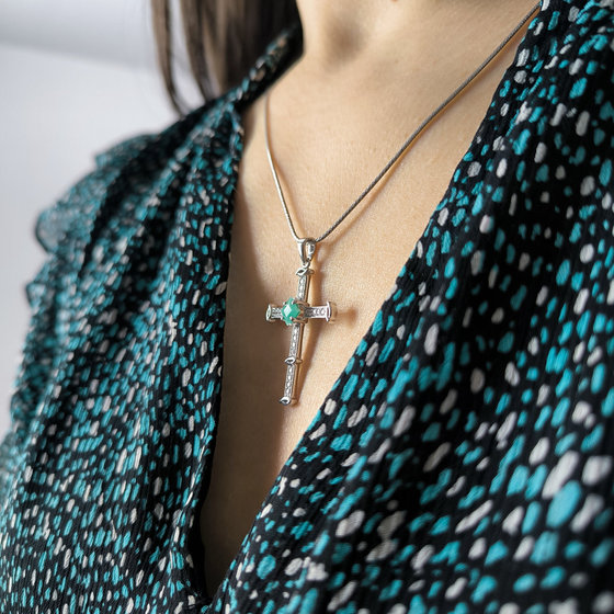 Silver cross with emerald and cubic zirconia