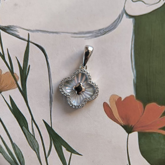 Silver pendant with cubic zirconia and mother-of-pearl