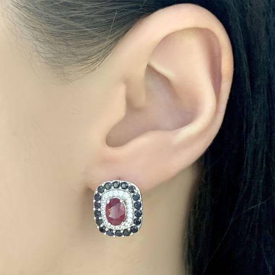 Silver earrings with a 4.575-carat ruby and a sapphire
