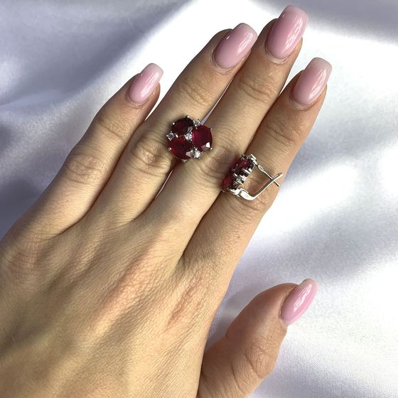 Silver earrings with a ruby