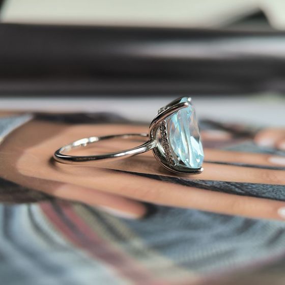 Silver ring with topaz
