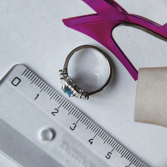 Silver ring with mystic topaz